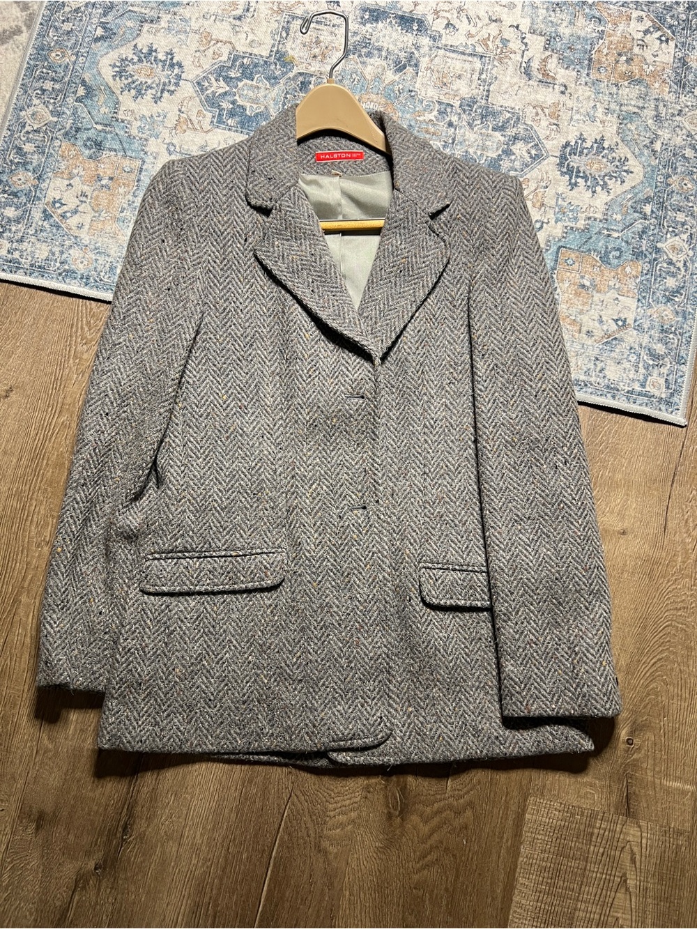 Vintage Halston blazer features a structured herringbone tweed pattern